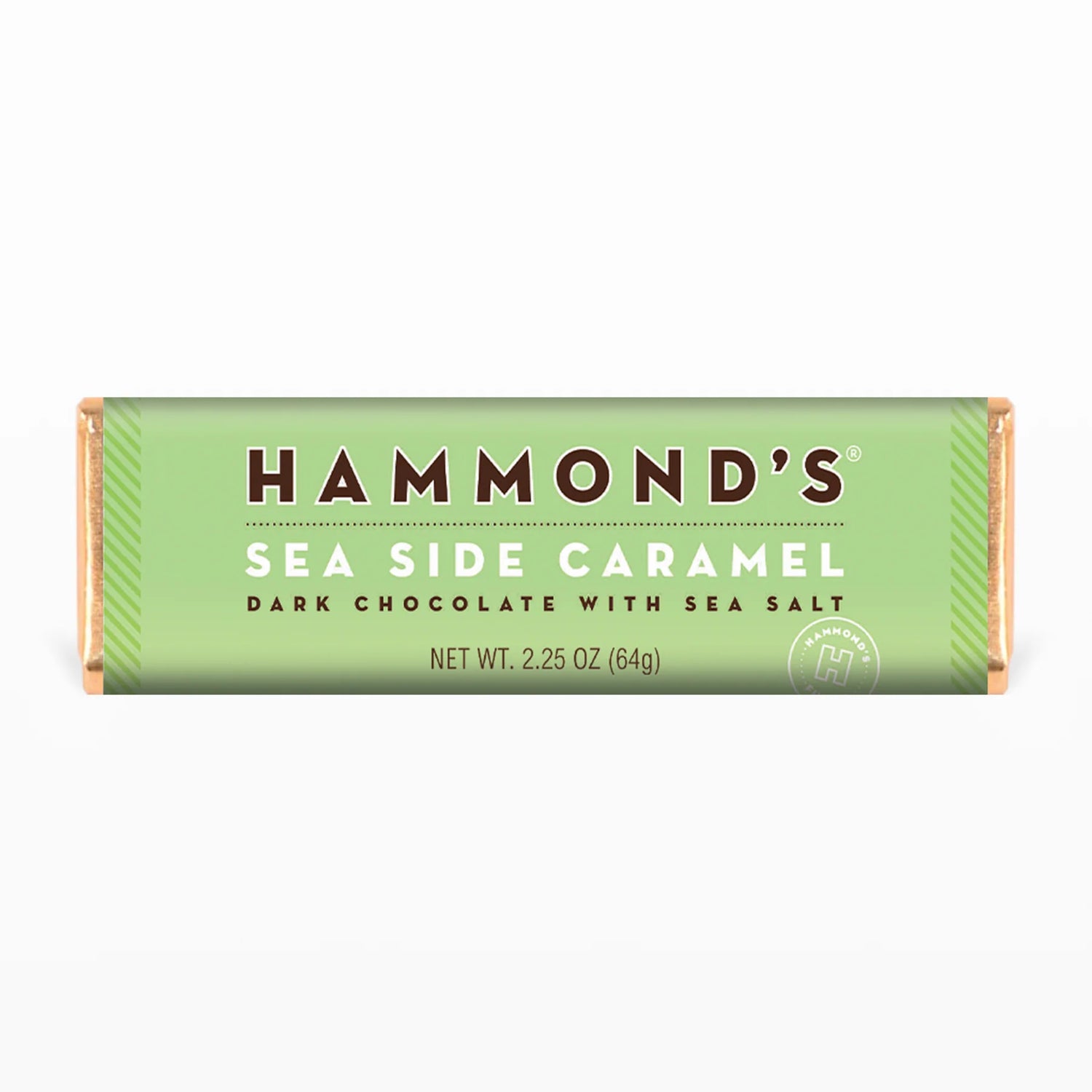 Indulge in pure decadence with Hammond's Natural Sea Side Caramel Dark Chocolate Bar. This candy bar is a chocolate lover's dream, featuring a delicious sea-salted caramel filling encased in smooth dark chocolate. Take a bite and let the rich, chocolatey outside and decadent caramel filling melt in your mouth.  2.25 oz. Chocolate Bars