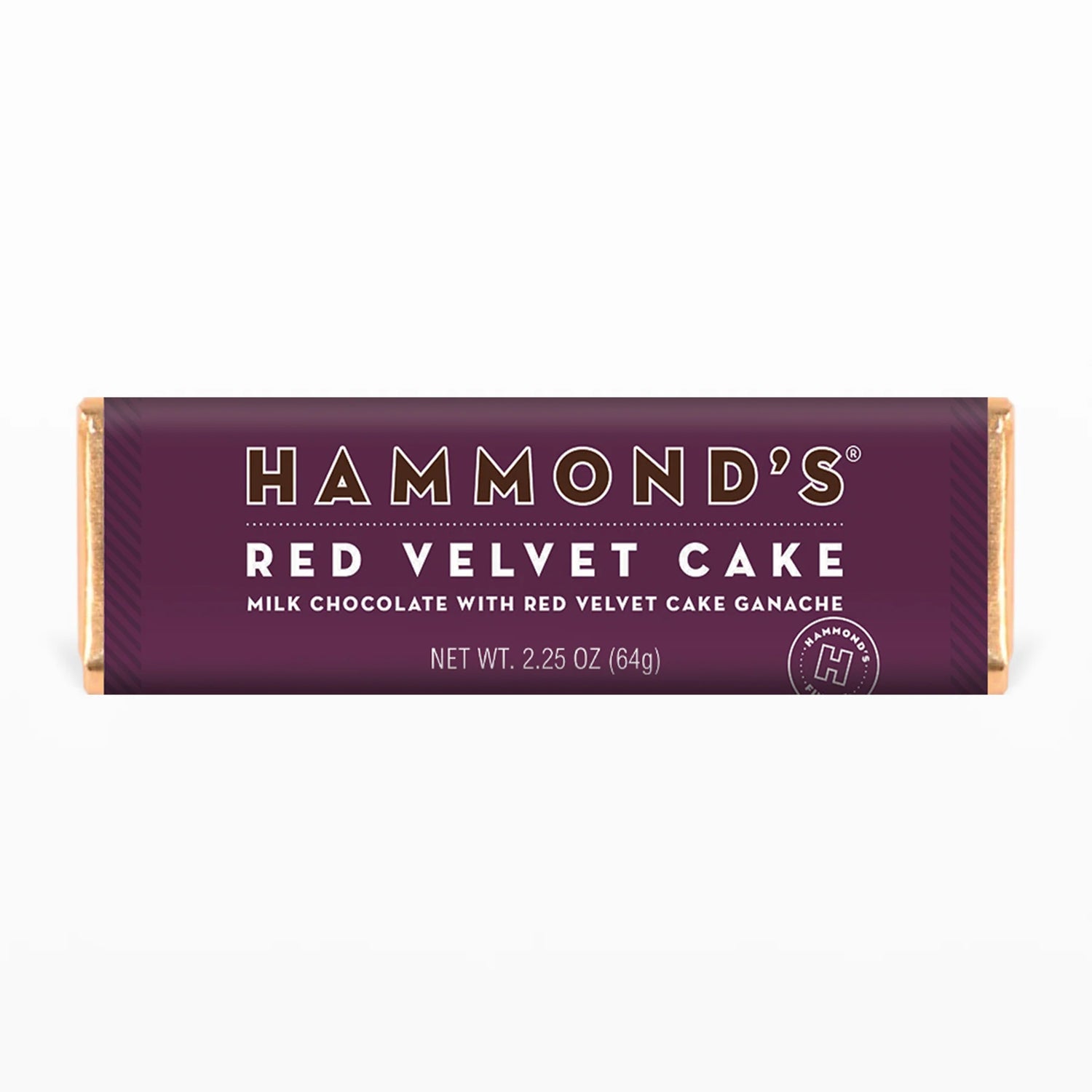 Satisfy your cake cravings with Hammond's Red Velvet Cake Ganache Chocolate Bar. This Belgian milk chocolate candy bar is filled with a rich and decadent red velvet cake ganache, offering a playful twist on a classic dessert. Indulge in the sweet and creamy flavor of red velvet cake without the need for baking. Bite into this delicious chocolate bar and experience the perfect combination of smooth milk chocolate and luscious cake filling.  2.25 oz. Chocolate Bars