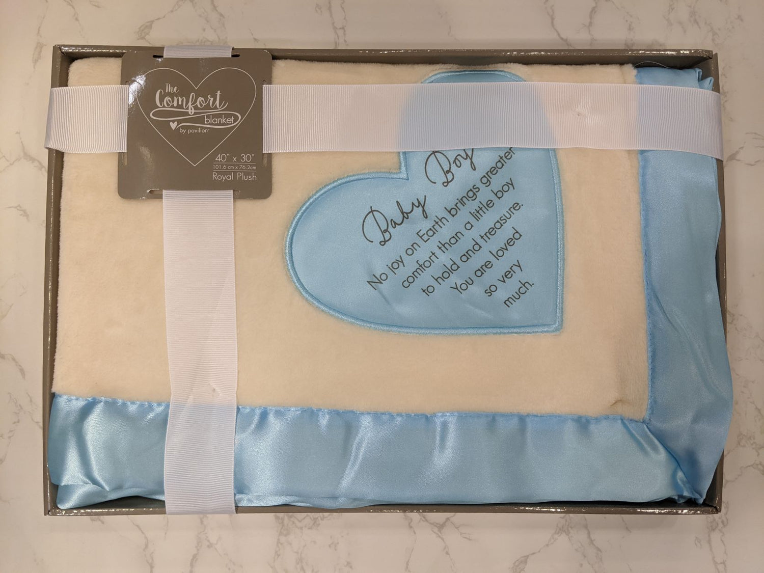30" x 40" Royal plush blanket, packaged in a ribbon-wrapped open-faced box,  features silk heart detail and edging.  This text is printed onto embroidered heart the "Baby Boy; No Joy On Earth Brings Greater Comfort Than A Little Boy To Hold And Treasure. You Are Loved So Very Much."  A perfect gift for the newest member of the family!