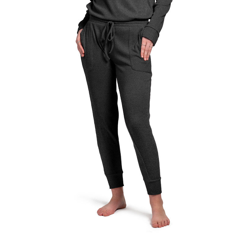 Treat yourself to cuddle worthy softness! We curated these cozy rib knit pants for luxurious comfort with a buttery mid-weight fabric and cozy side pockets. Matching drawstring pouch packaging makes this item a great gift!  Color choices black, blue, wine and green.