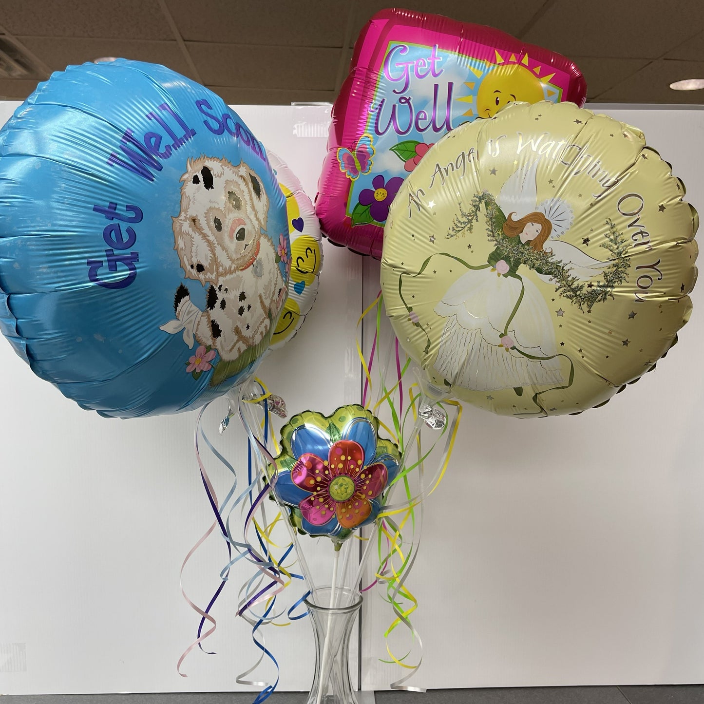 5- balloons in a vase, can be themed for Get Well or Baby.