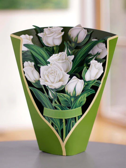 Show someone you care with a warm arrangement of FreshCut Paper pop up flowers. This is a greeting card and a vibrant bouquet. This lively display will bloom for a long time and can be used in the ICU. White Roses shown here.